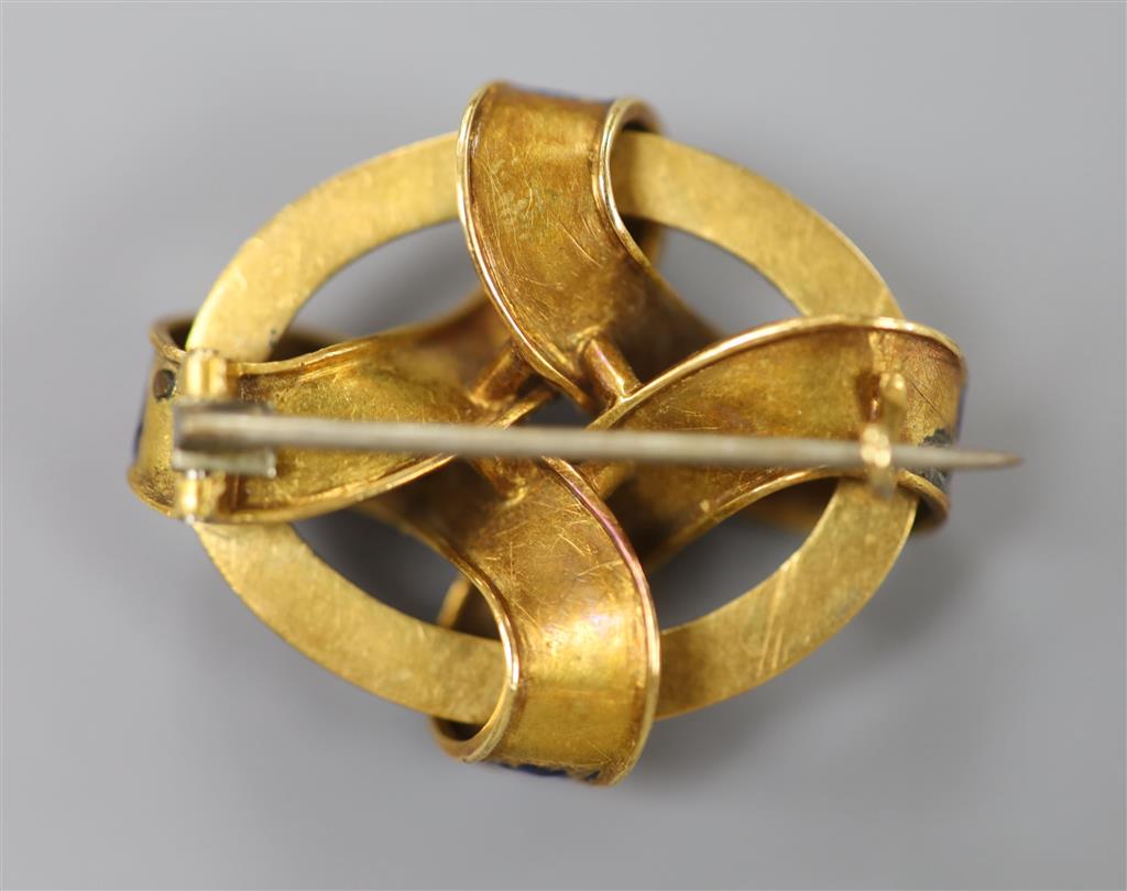 A Victorian yellow metal, blue enamel and split pearl set interwoven oval brooch, 35mm, gross 14 grams.